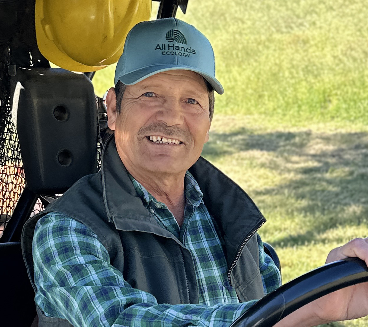 staffmember Tomas Ruiz sits in an ATV