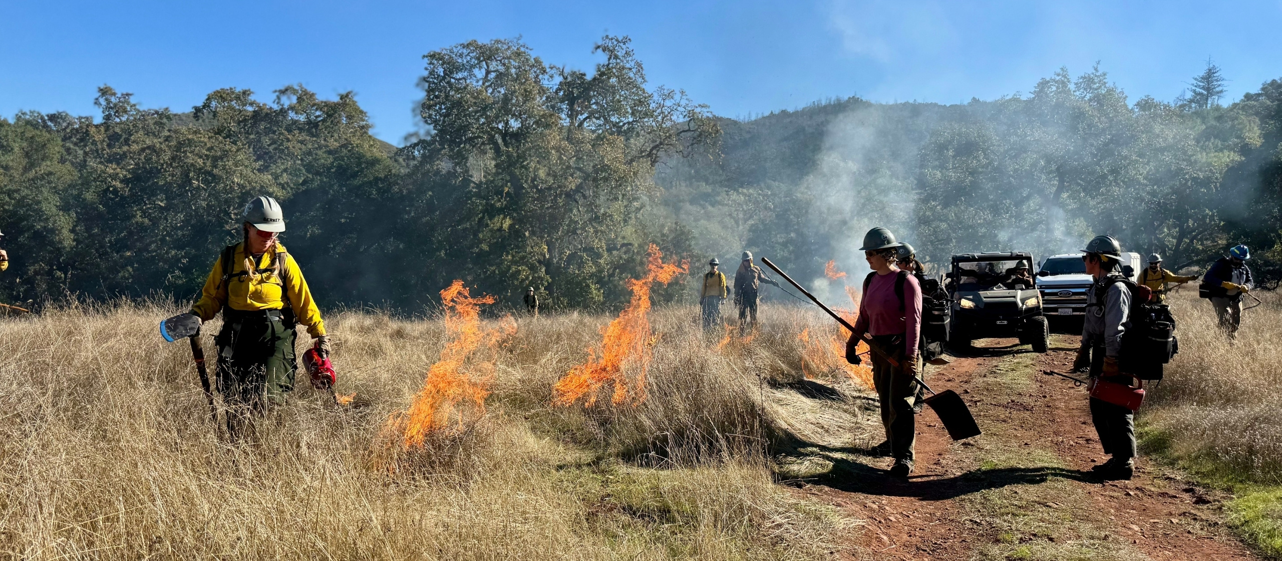 A wide shot of Julia leading blacklining operations with Fire Forward at Bouverie