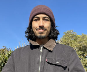 close-up of Johnathen Carmona with blue sky and trees in the background
